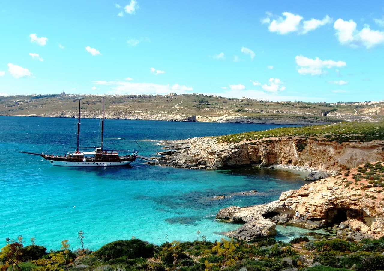 Crystal-clear turquoise water at Blue Lagoon Comino Malta — the water colour is real and spectacular